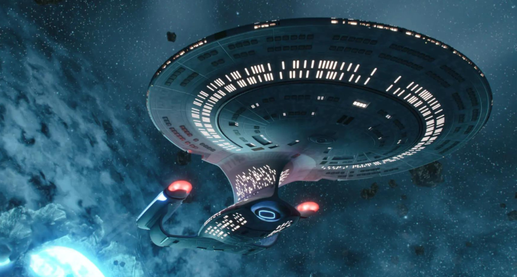 The starship Enterprise in front of the glowing cosmos